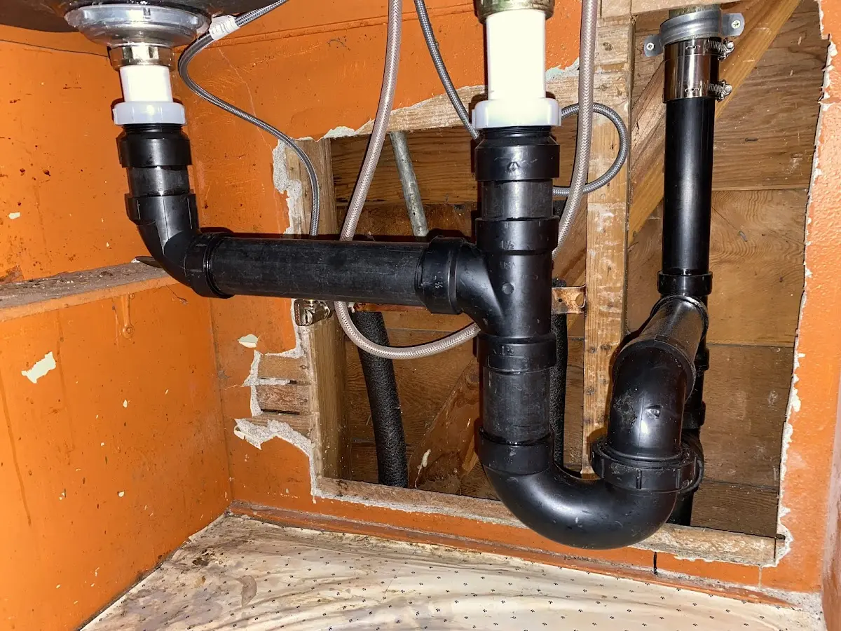 Professional Garbage Disposal Repair equipment and tools on the job in Dover